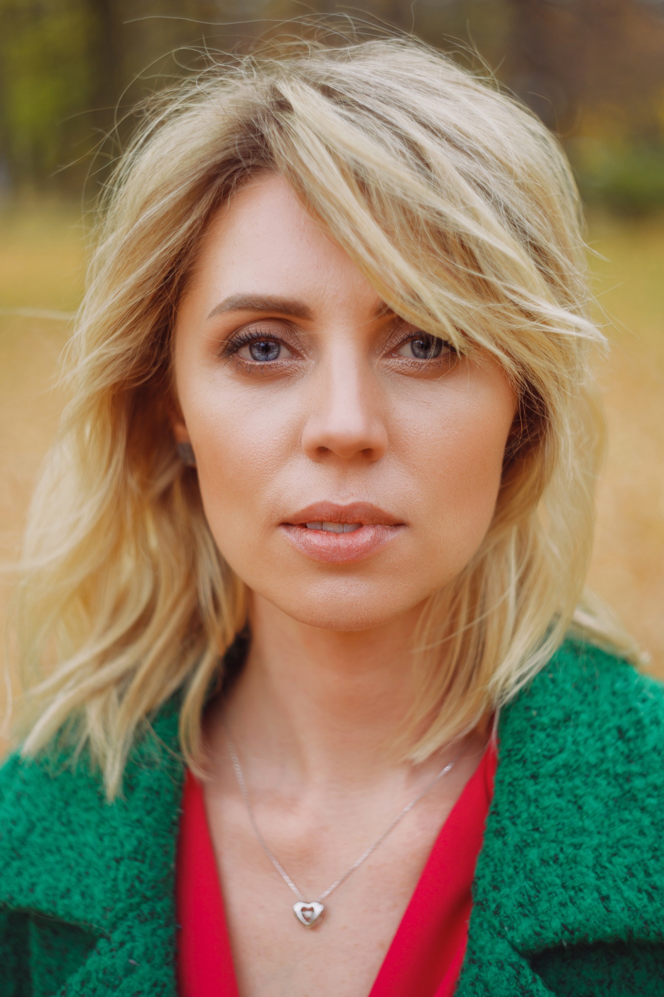 Portrait of Lovely Middle Aged Woman at Autumn Park